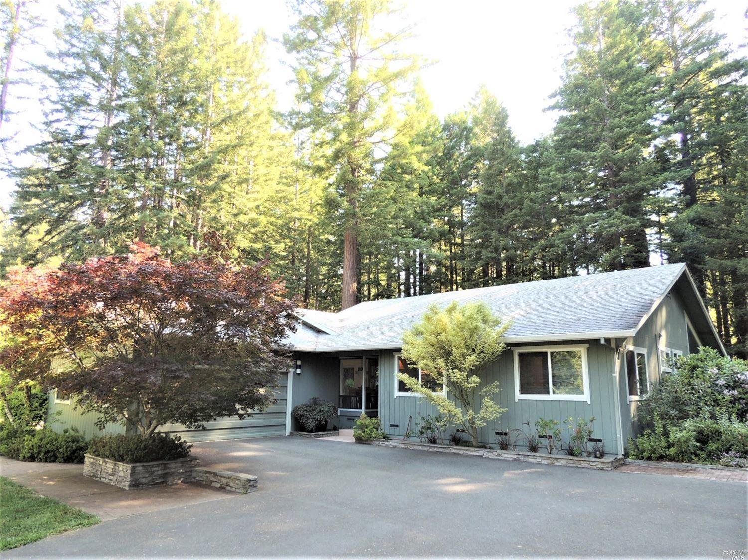 13456 Occidental Road Sebastopol, CA 95472 - Photo 1 of 1 front view of a house with a garden