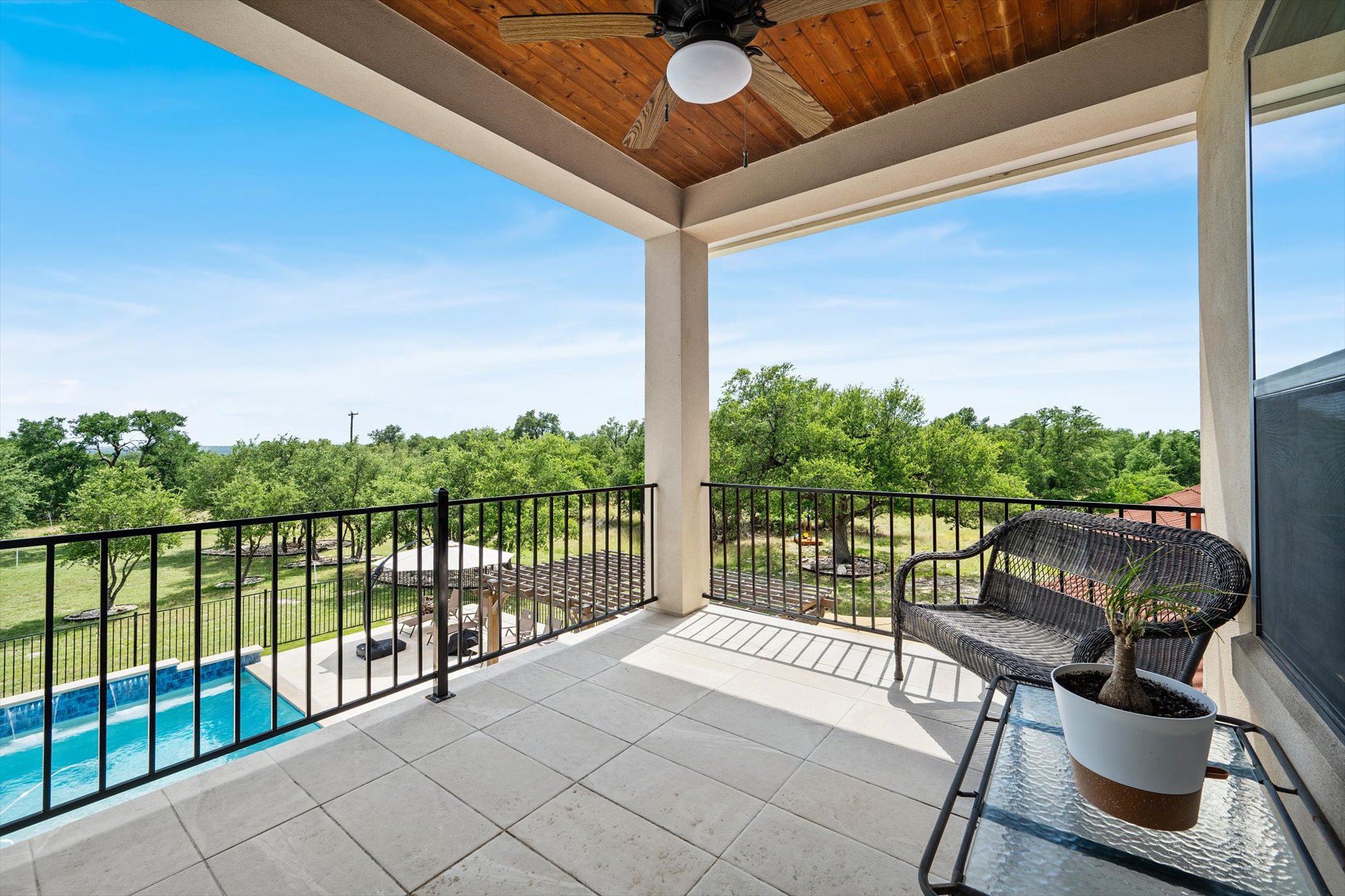 638 Strada Luca Florence, TX 76527 - Photo 20 of 38 Enjoy scenic outdoor living from this covered patio with refreshing pool and verdant views.