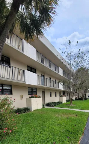 a view of a house with a street