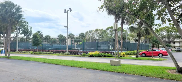 a view of a park and trees