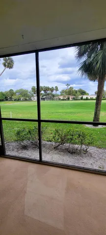 a view of a road with a big yard