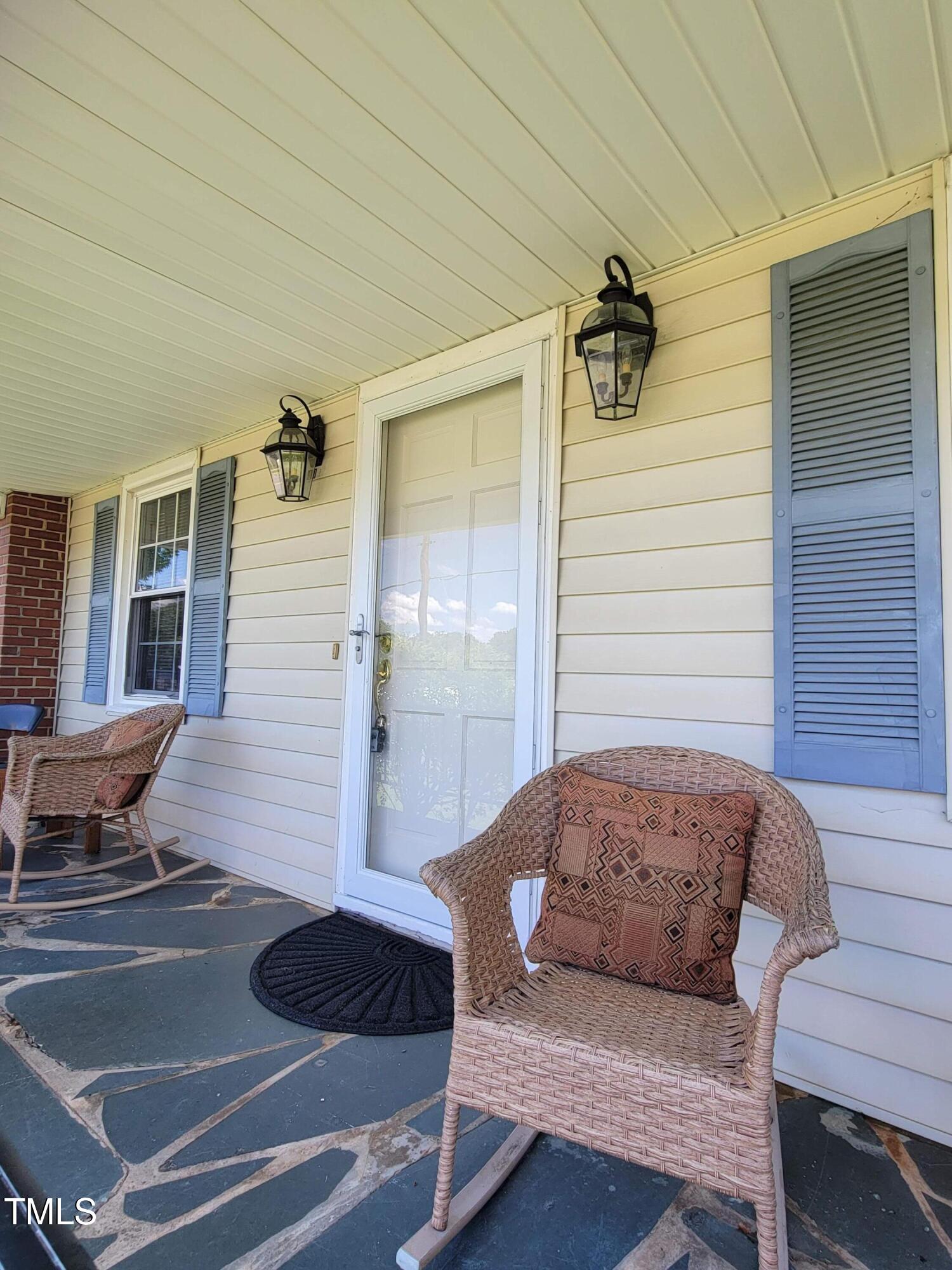 411 West Raleigh Street Siler City, NC 27344 - Photo 3 of 33 a view of a livingroom with furniture and outdoor space