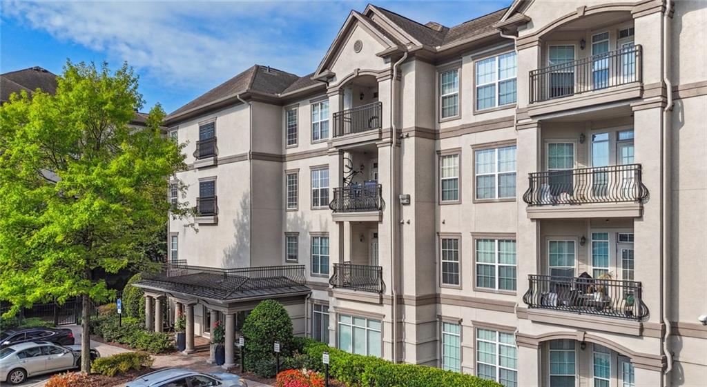 2910 Clairmont Road, Unit PLAN 5 Atlanta, GA 30329 - Photo 6 of 29 a view of a building with a lot of windows