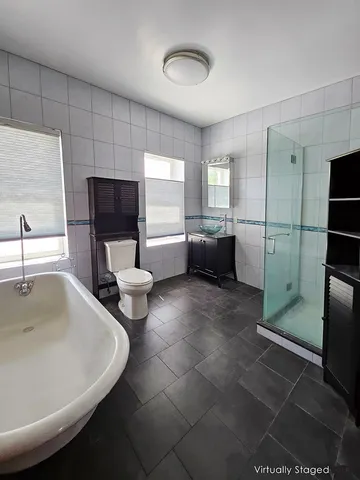 a kitchen with a sink and a refrigerator