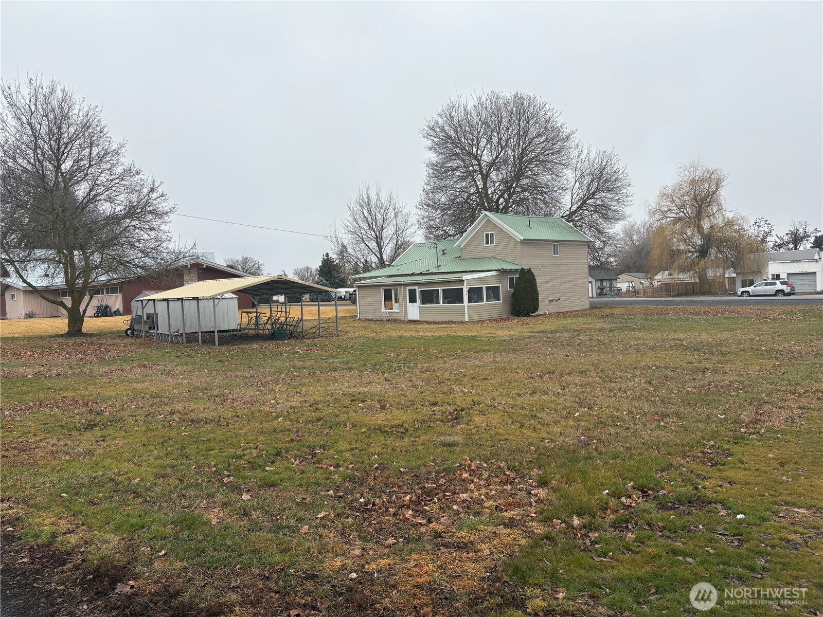 208 North 3rd Street Harrington, WA 99134 - Photo 9 of 16 a view of a house with a yard