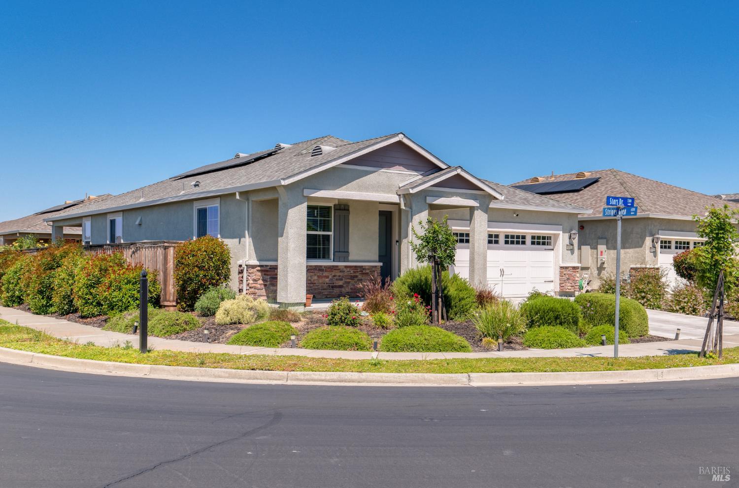 2211 Stars Drive Rio Vista, CA 94571 - Photo 2 of 24 a front view of a house with a yard and porch