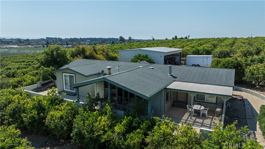 215 Rancho Road Nipomo, CA 93444 - Photo 3 of 6 an aerial view of a house with garden space and outdoor seating