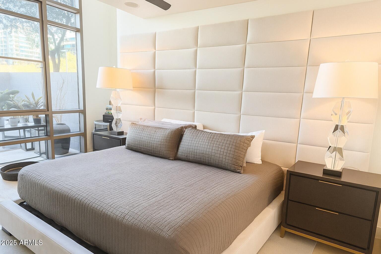 15215 North Kierland Boulevard, Unit 103 Scottsdale, AZ 85254 - Photo 6 of 20 a bedroom with a bed and a window