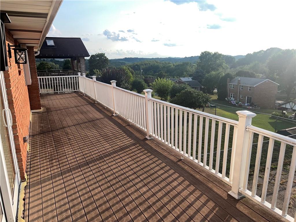 7 Fieldcrest Drive Cecil, PA 15321 - Photo 13 of 15 a view of a balcony with wooden floor