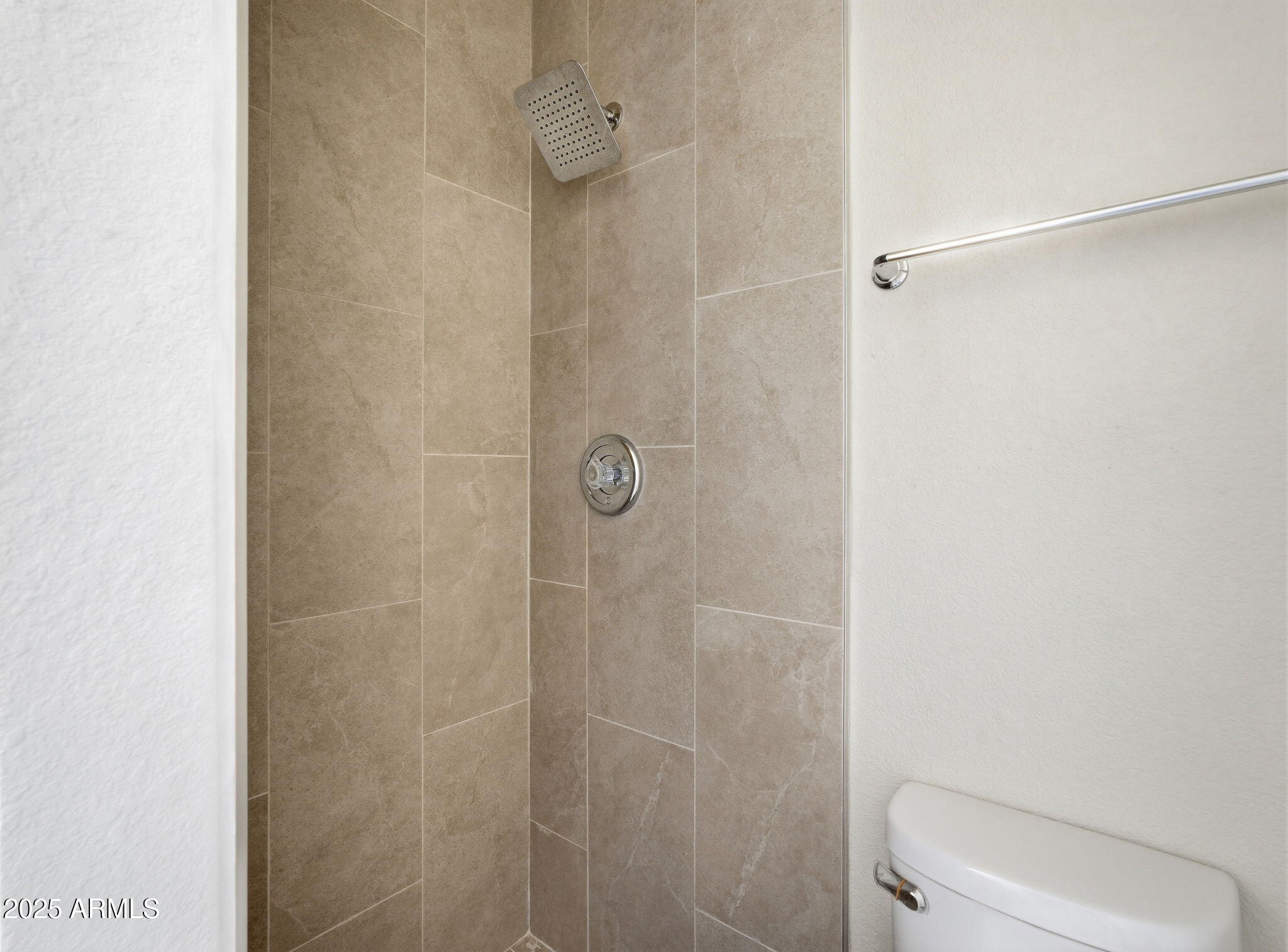 510 North Alma School Road, Unit 223 Mesa, AZ 85201 - Photo 19 of 25 a white toilet sitting next to a shower
