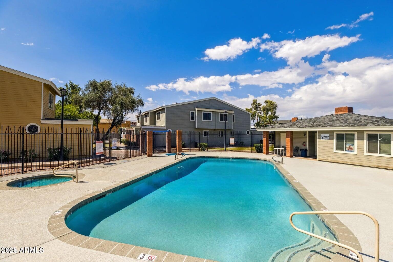 510 North Alma School Road, Unit 223 Mesa, AZ 85201 - Photo 23 of 25 a view of a house with swimming pool