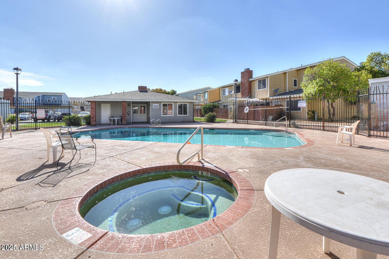 510 North Alma School Road, Unit 223 Mesa, AZ 85201 - Photo 24 of 25 a view of a house with a swimming pool