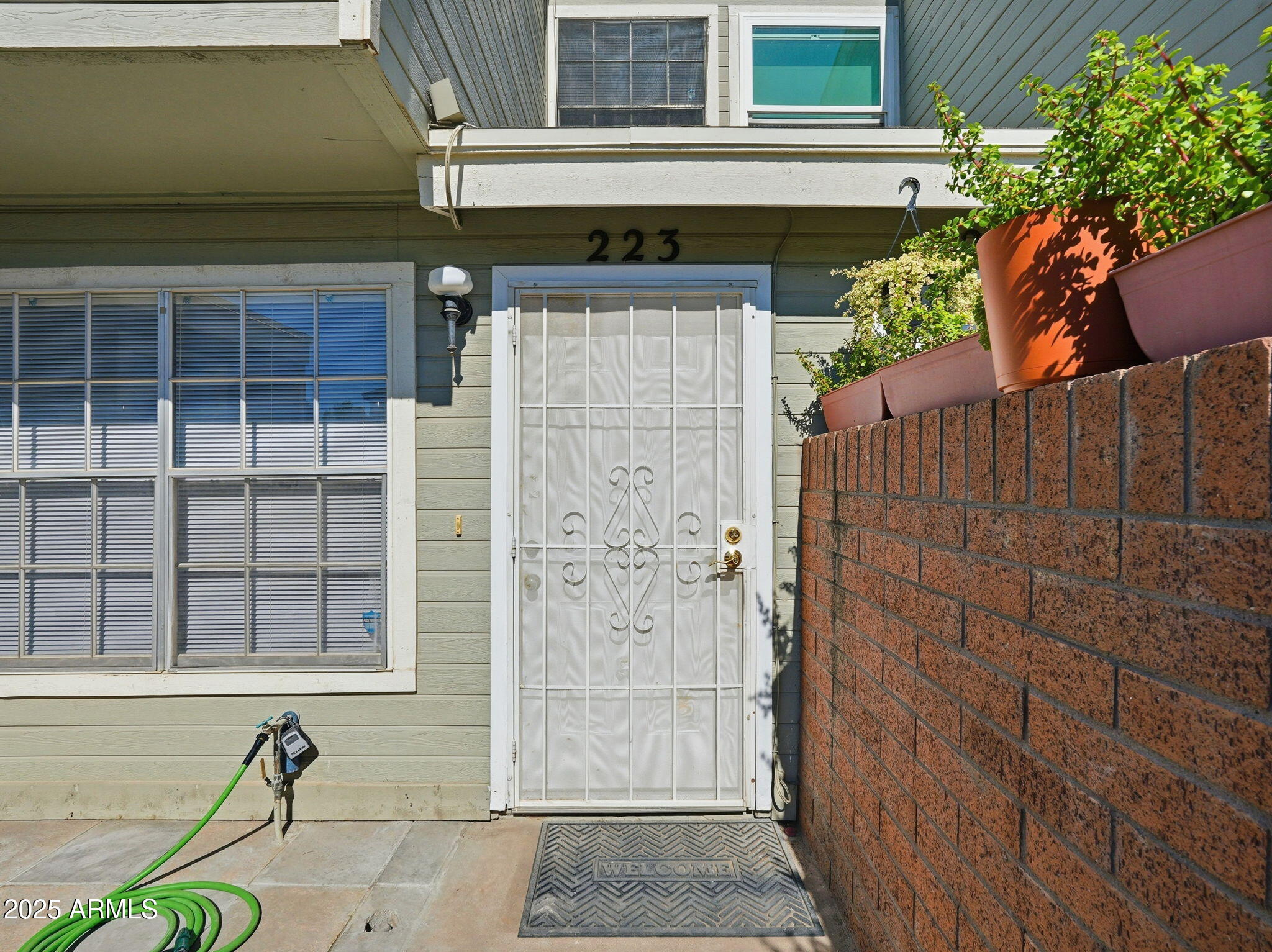 510 North Alma School Road, Unit 223 Mesa, AZ 85201 - Photo 3 of 25 a front view of a house with a shower