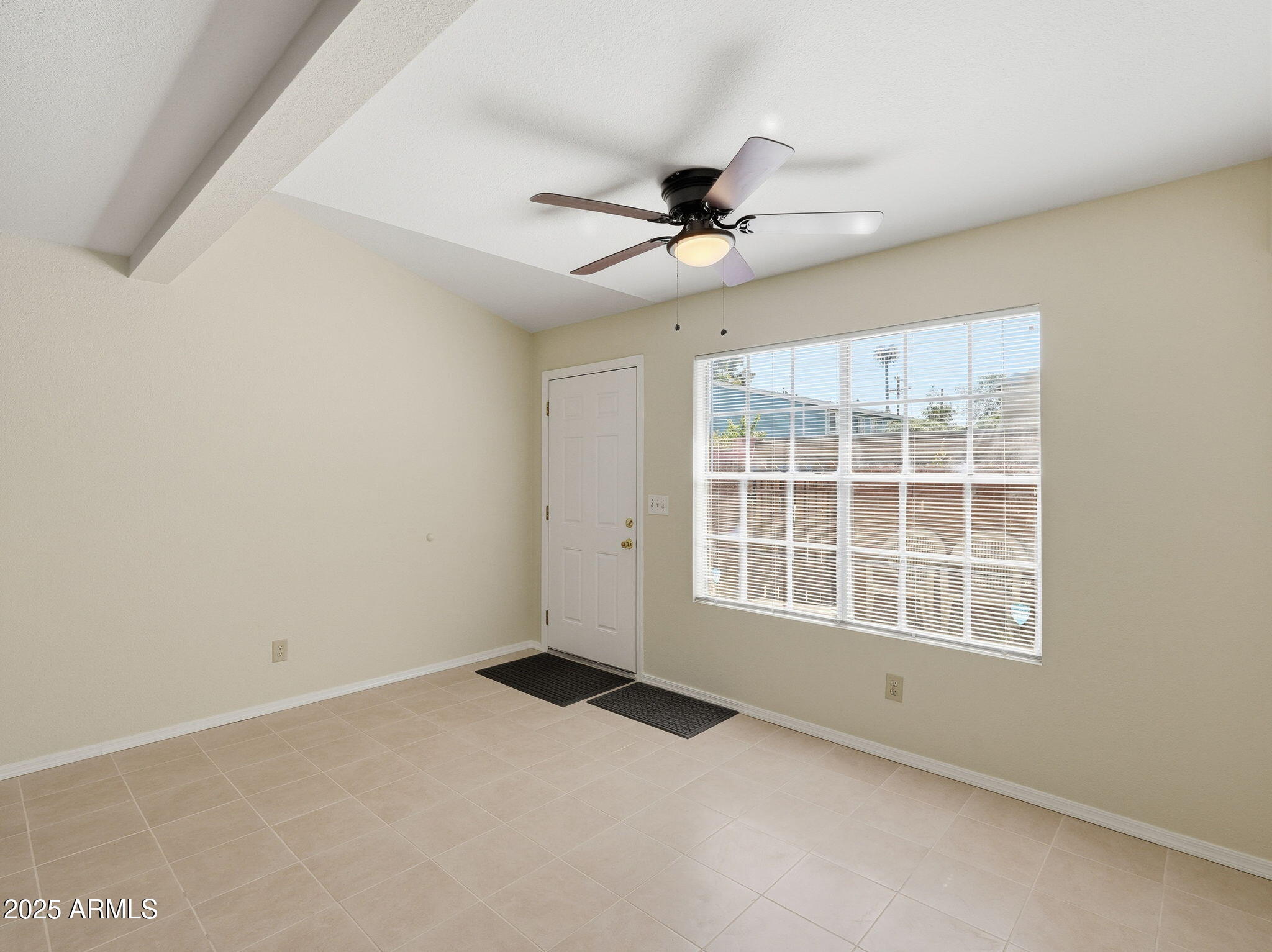 510 North Alma School Road, Unit 223 Mesa, AZ 85201 - Photo 6 of 25 a view of an empty room with a window