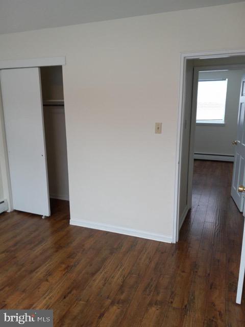 901 East Pleasant Avenue Glenside, PA 19038 - Photo 7 of 7 an empty room with wooden floor and windows