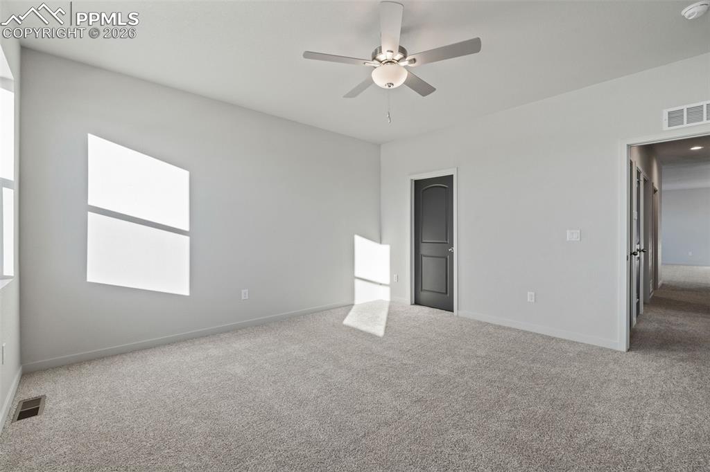 24615 Big Springs Road Calhan, CO 80808 - Photo 11 of 40 a view of an empty room with a window