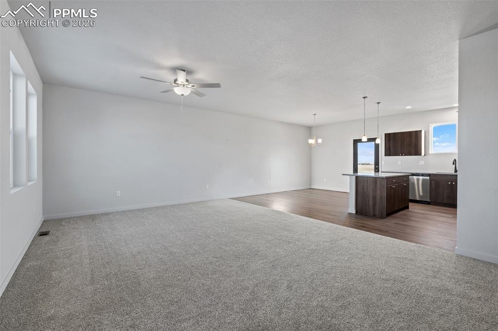 24615 Big Springs Road Calhan, CO 80808 - Photo 20 of 40 an empty room with furniture and ceiling fan