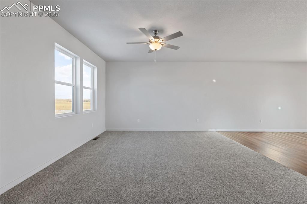 24615 Big Springs Road Calhan, CO 80808 - Photo 21 of 40 a view of an empty room with a window