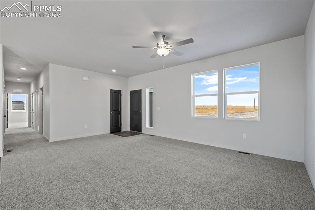 24615 Big Springs Road Calhan, CO 80808 - Photo 24 of 40 a view of an empty room with a window