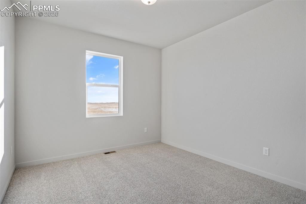 24615 Big Springs Road Calhan, CO 80808 - Photo 27 of 40 a view of an empty room with a window