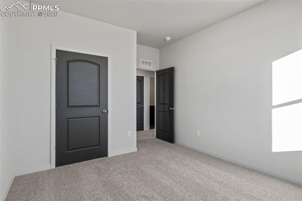 24615 Big Springs Road Calhan, CO 80808 - Photo 28 of 40 a view of hallway with windows
