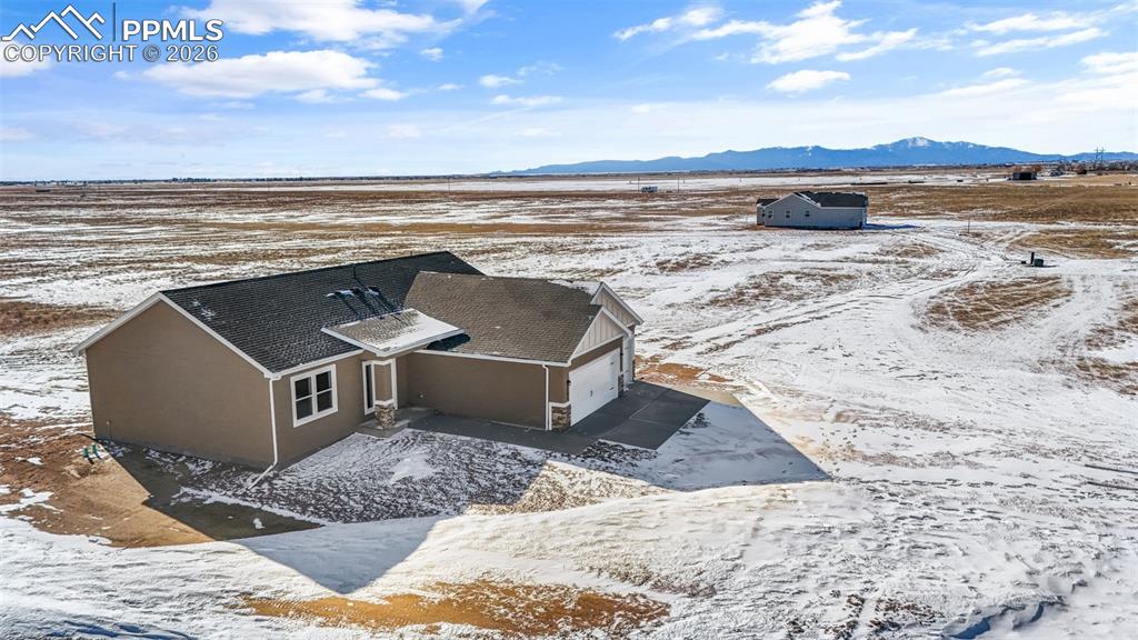 24615 Big Springs Road Calhan, CO 80808 - Photo 38 of 40 a view of a ocean beach and a building