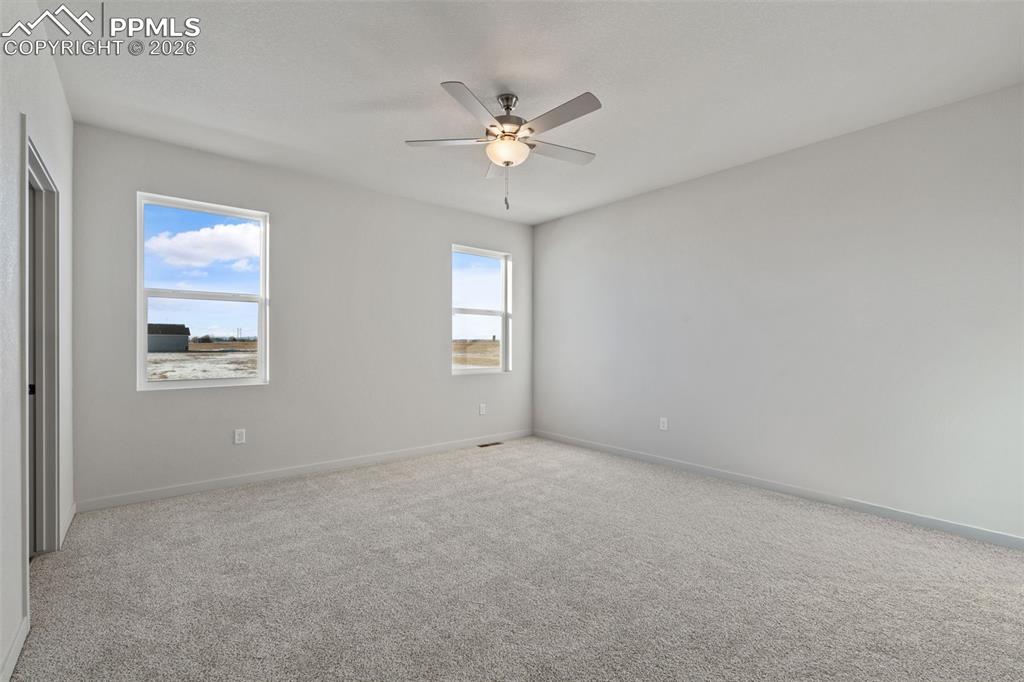 24615 Big Springs Road Calhan, CO 80808 - Photo 10 of 40 a view of an empty room with a window