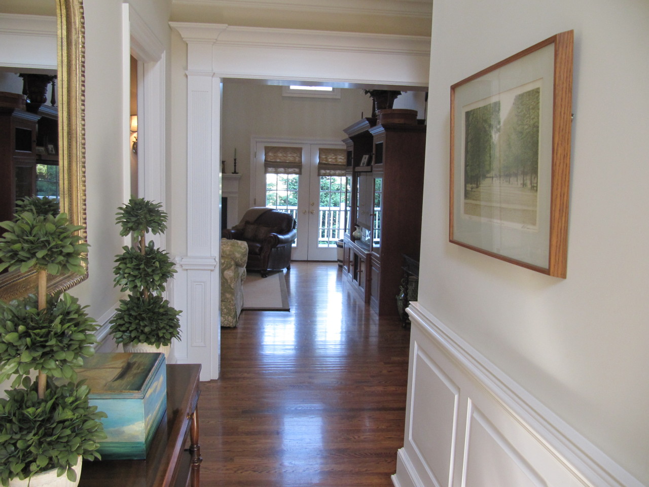 631 Long Ridge Road, Unit 14 Stamford, CT 06902 - Photo 7 of 12 a hallway with wooden floor and a potted plant