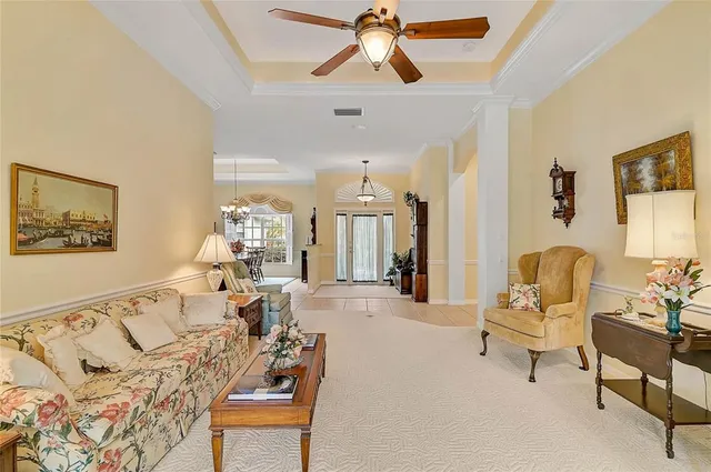 a bedroom with a large bed couch and dresser