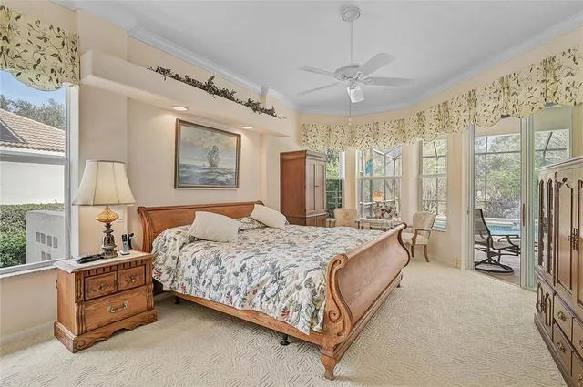 a bathroom with a granite countertop sink and a large mirror