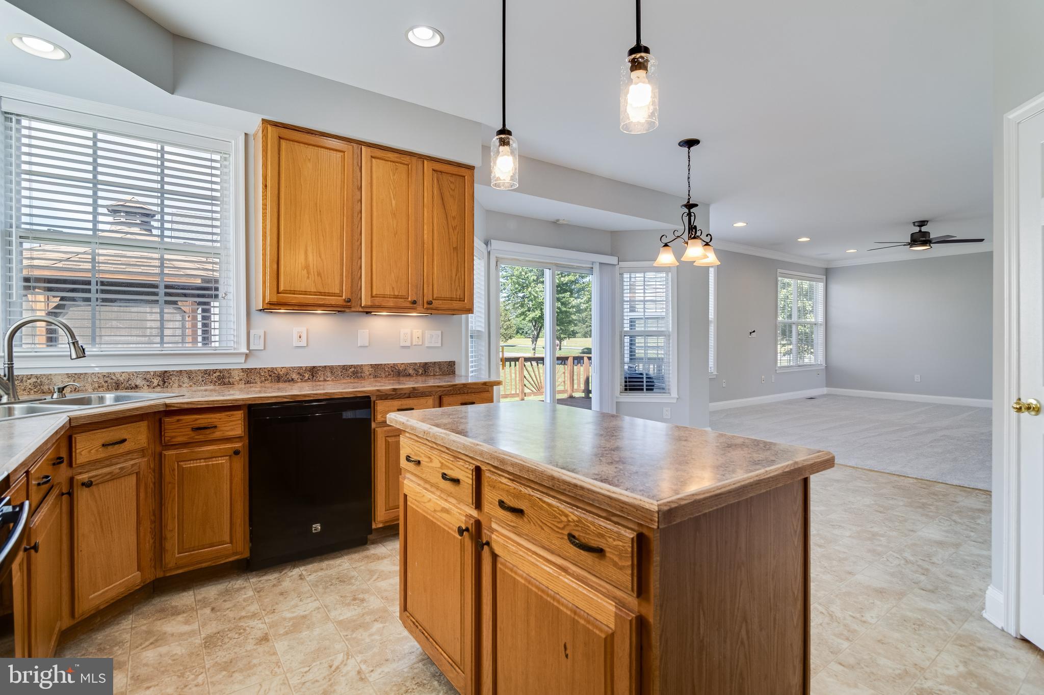 1020 Chaff Way La Plata, MD 20646 - Photo 20 of 44 a kitchen with granite countertop a sink cabinets and window