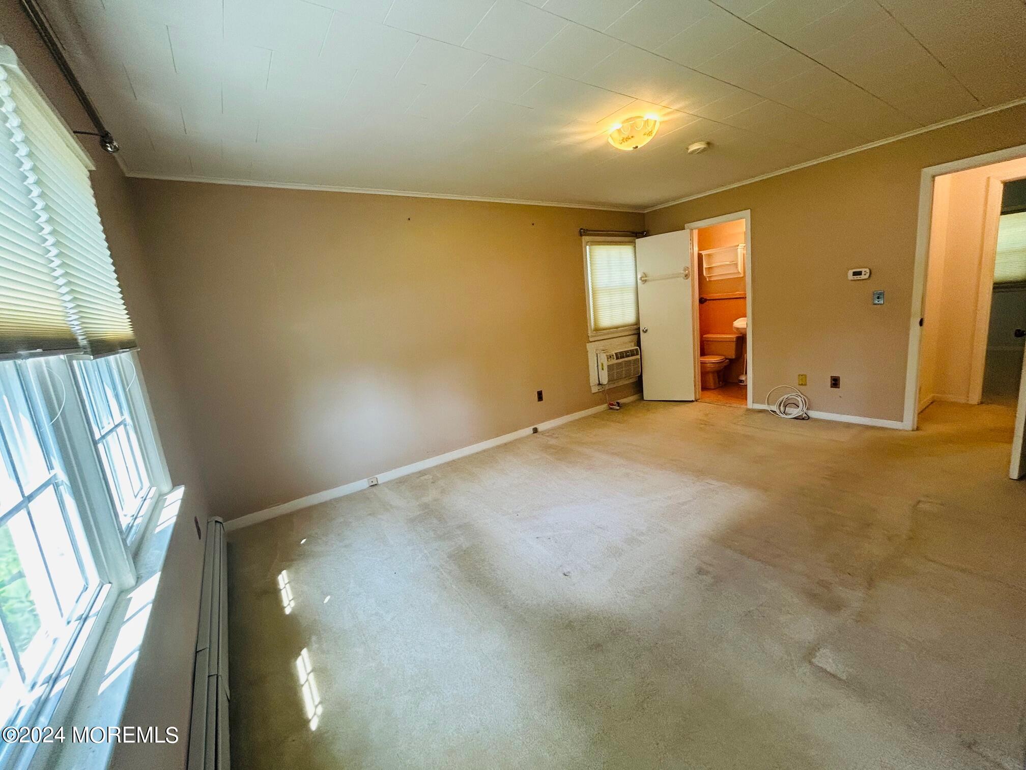 2402 Anne Terrace Wall, NJ 07719 - Photo 17 of 25 a view of an empty room with a window