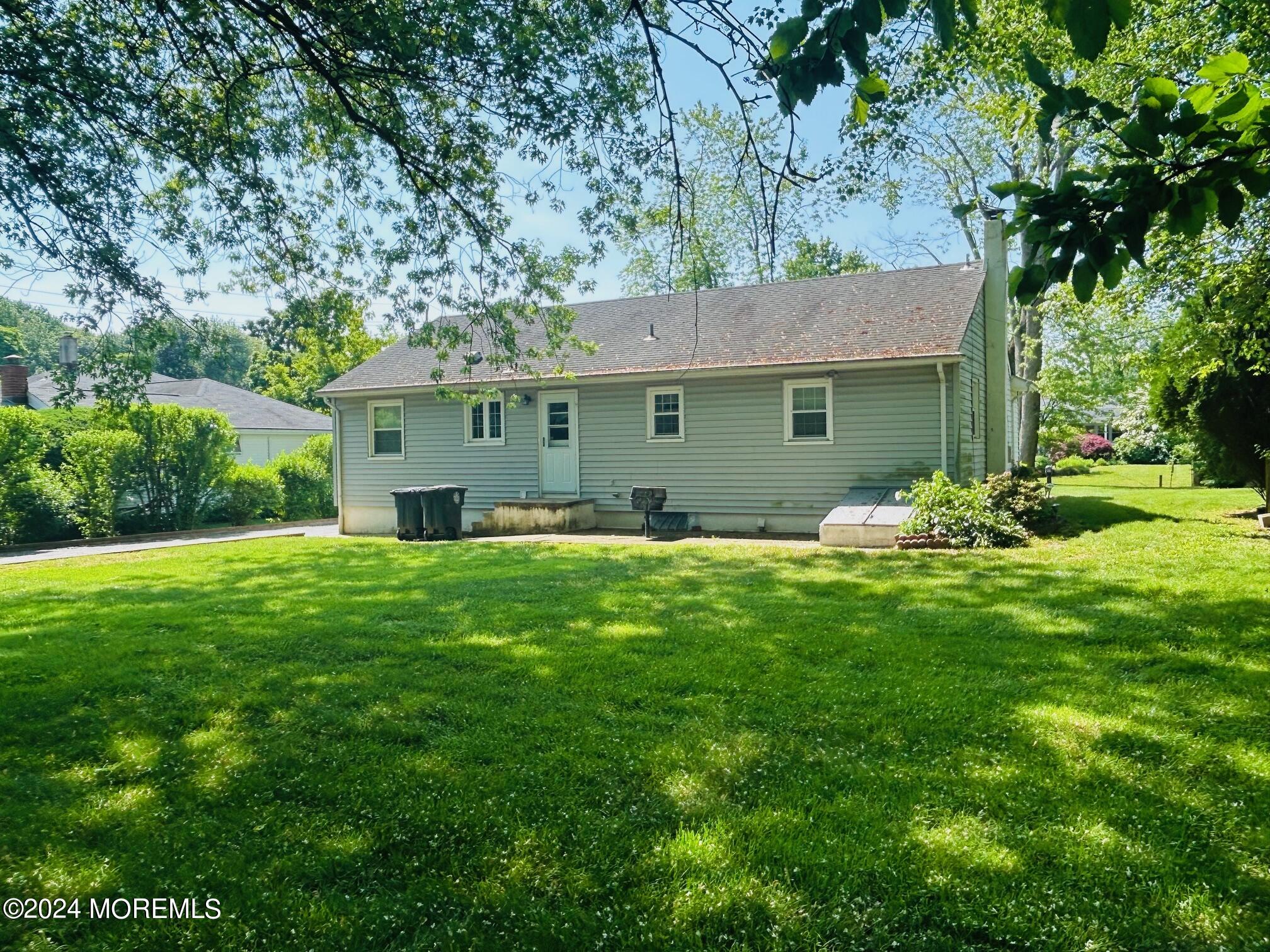 2402 Anne Terrace Wall, NJ 07719 - Photo 4 of 25 a front view of house with yard and green space