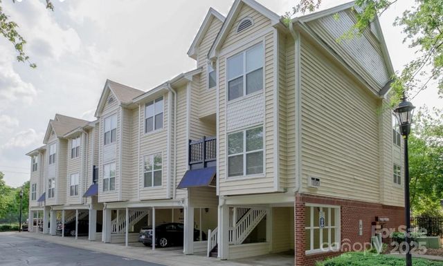 a view of a building with a street