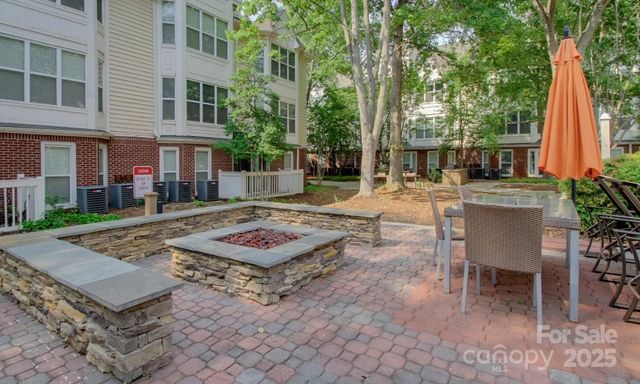 a view of a dinning table and chair in the patio