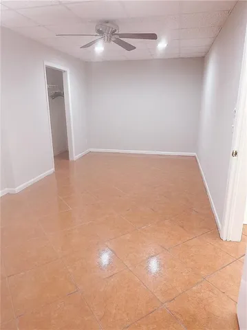 an empty room with a bathroom