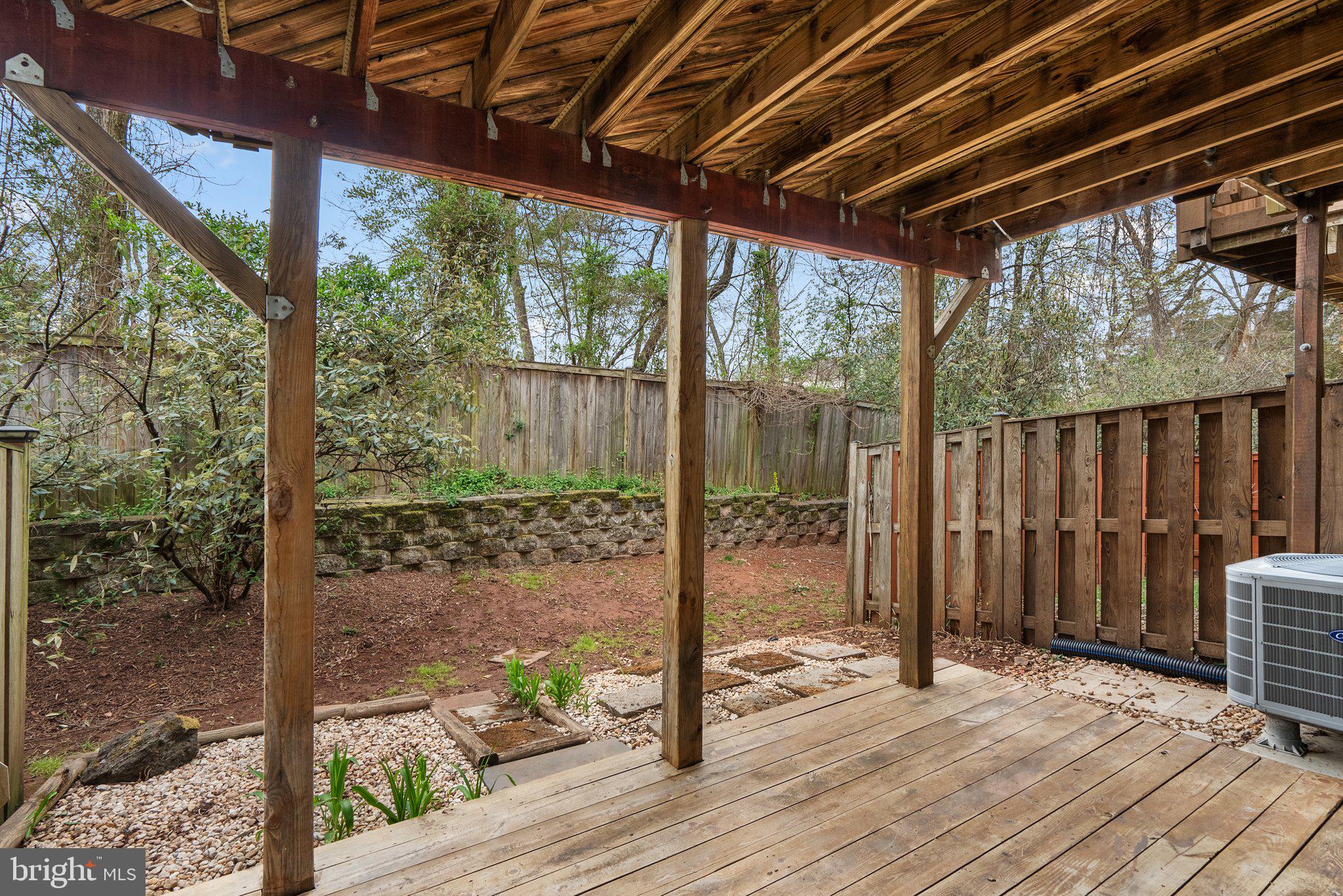 21937 Thompson Square Sterling, VA 20166 - Photo 11 of 48 a view of backyard with green space