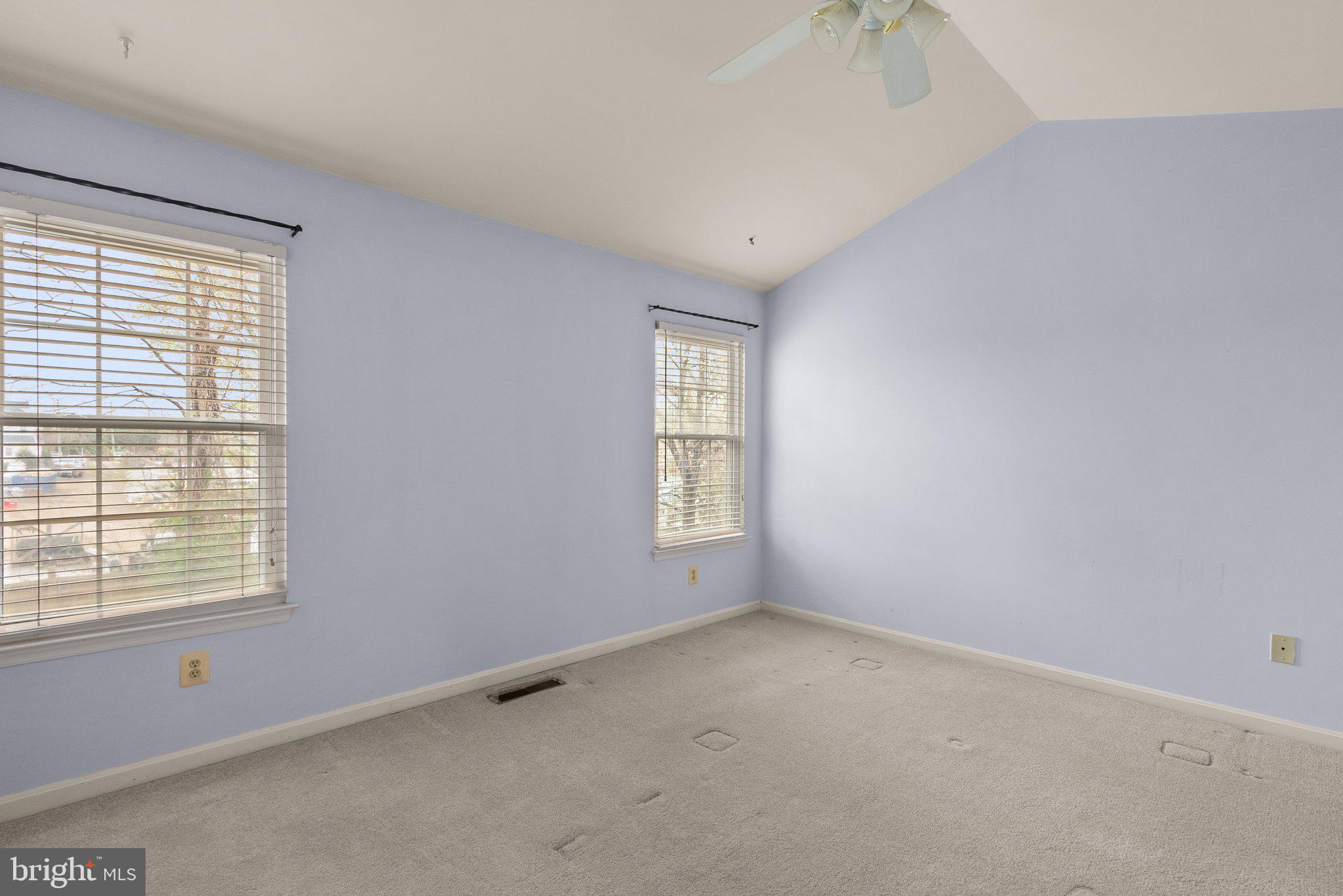 21937 Thompson Square Sterling, VA 20166 - Photo 34 of 48 a view of an empty room with a window