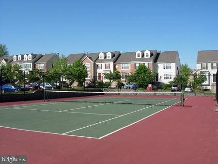 21937 Thompson Square Sterling, VA 20166 - Photo 47 of 48 a view of a tennis court