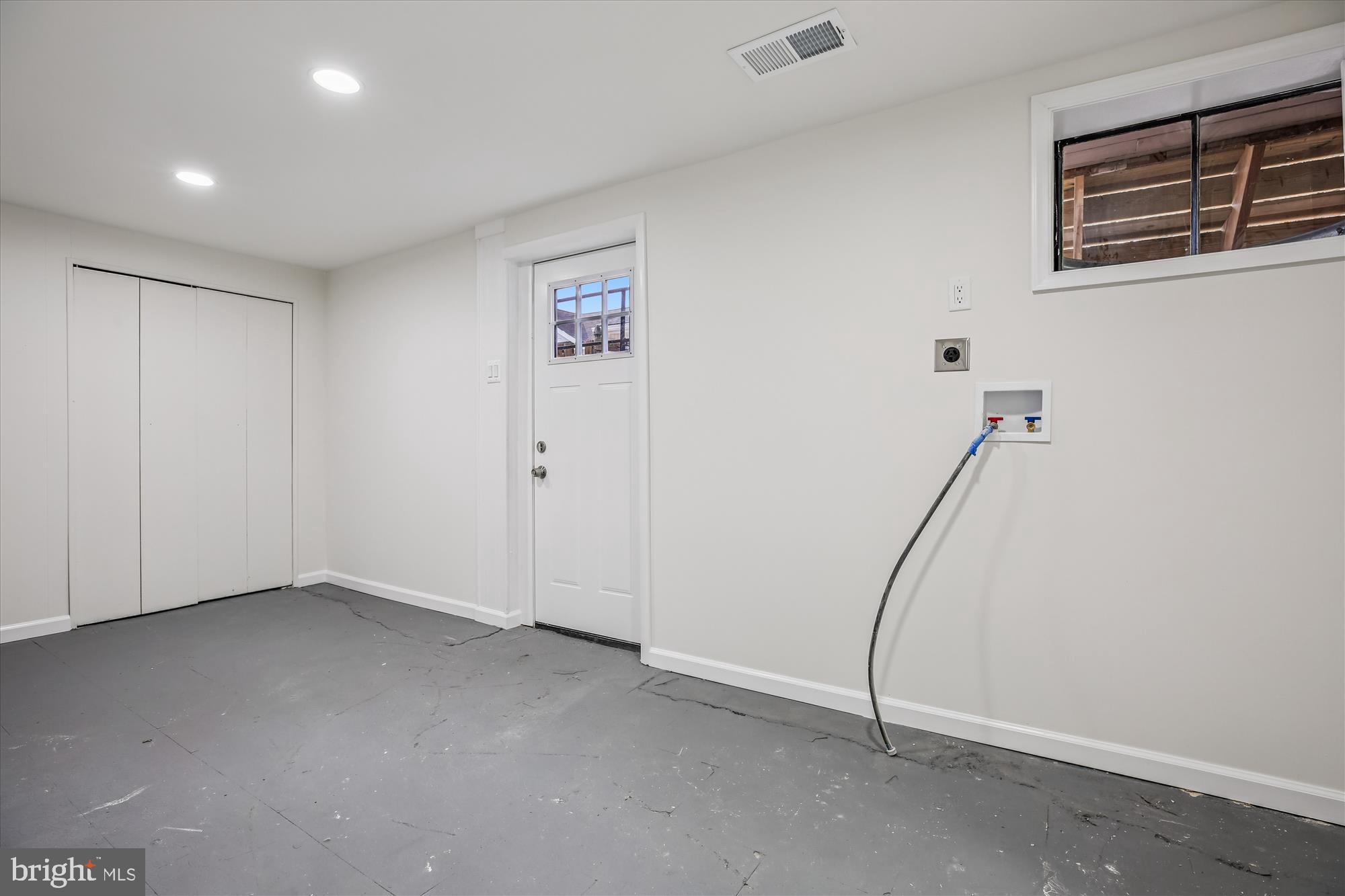 11502 Nairn Road Silver Spring, MD 20902 - Photo 32 of 43 a view of a room with drop ceiling