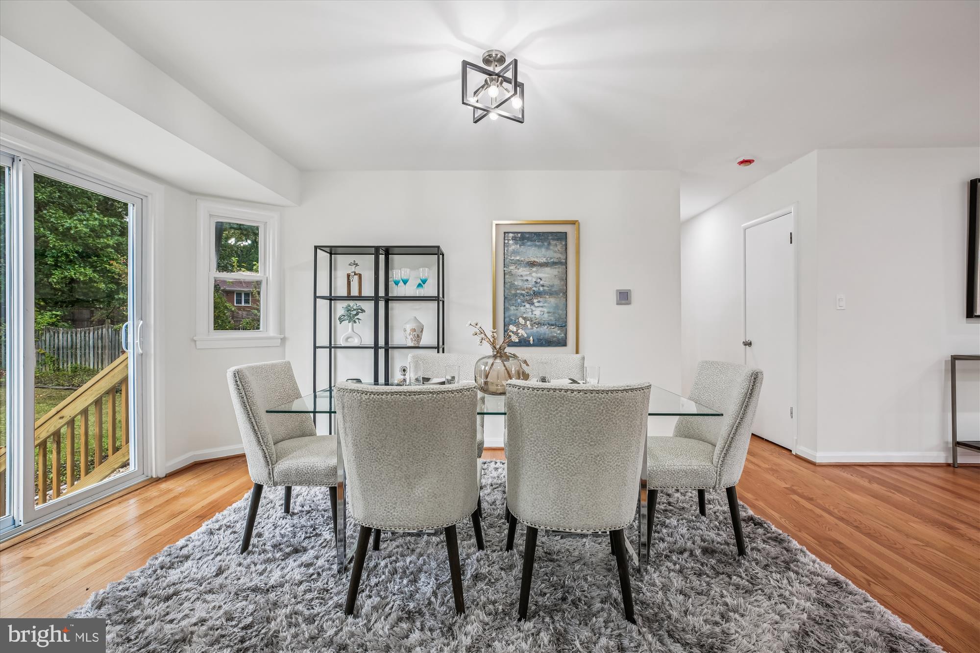 11502 Nairn Road Silver Spring, MD 20902 - Photo 10 of 43 a view of a dining room with furniture and wooden floor