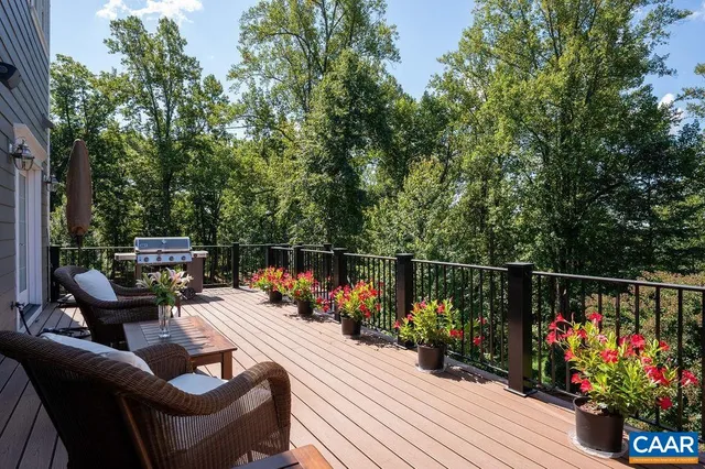 a kitchen with stainless steel appliances granite countertop a sink and a window