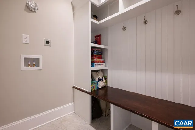 a bedroom with a large bed and a couch