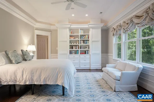 a bathroom with double sink and a mirror
