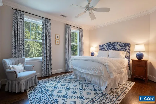 a bathroom with a toilet and a bath tub