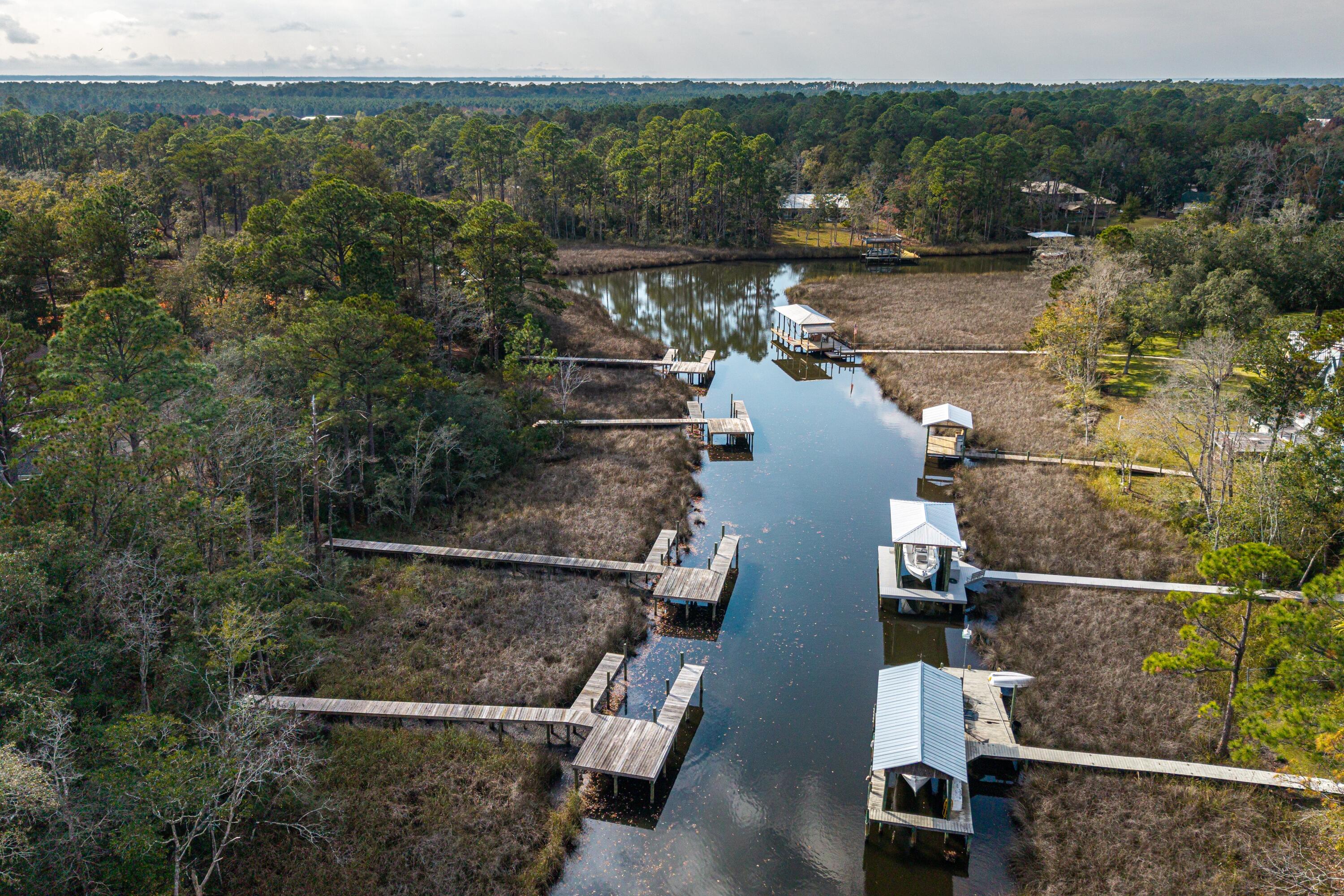 151 Redfish Pt Drive Freeport, FL 32439 - Photo 30 of 40 an aerial view of houses with yard