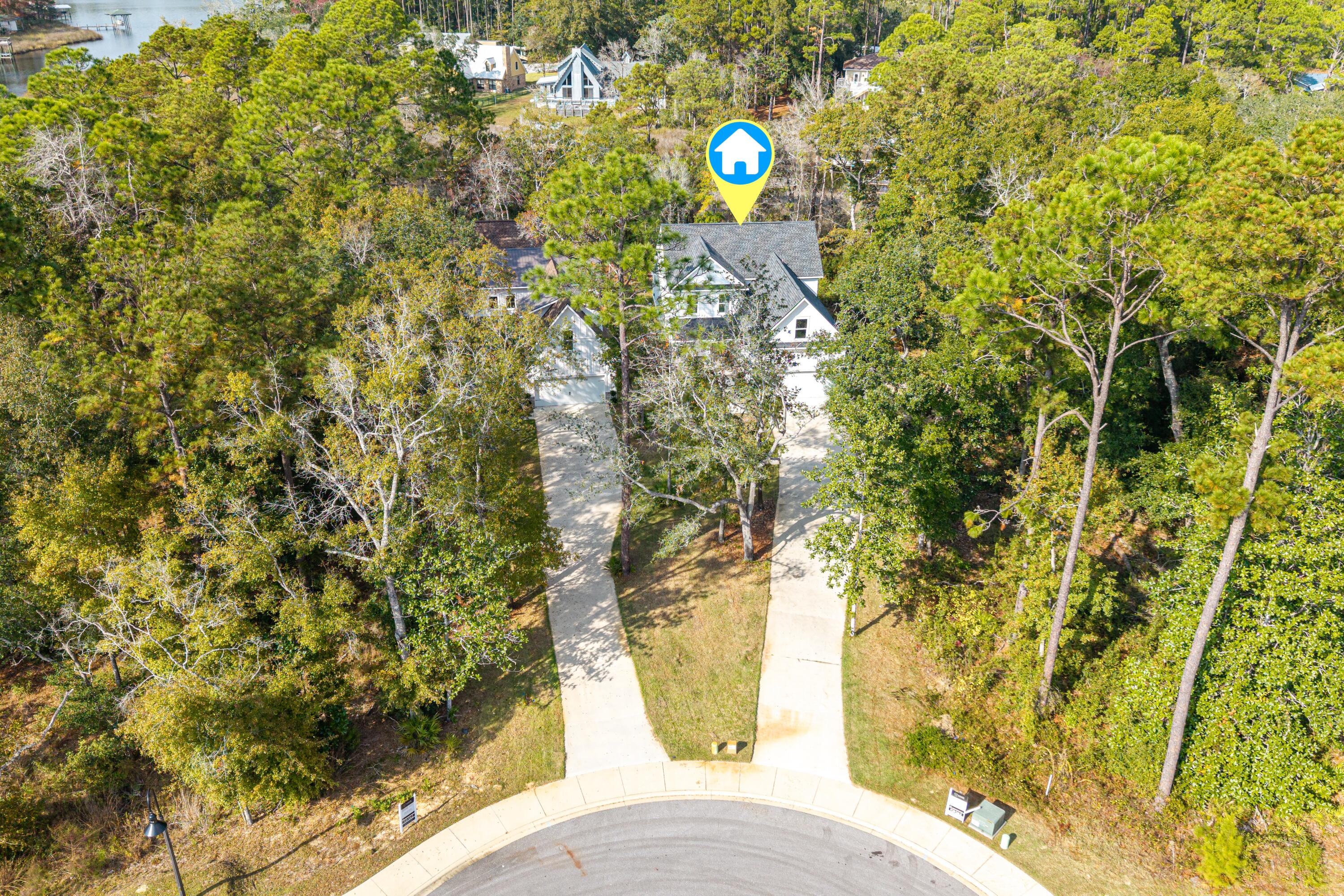 151 Redfish Pt Drive Freeport, FL 32439 - Photo 34 of 40 a view of outdoor space and tree