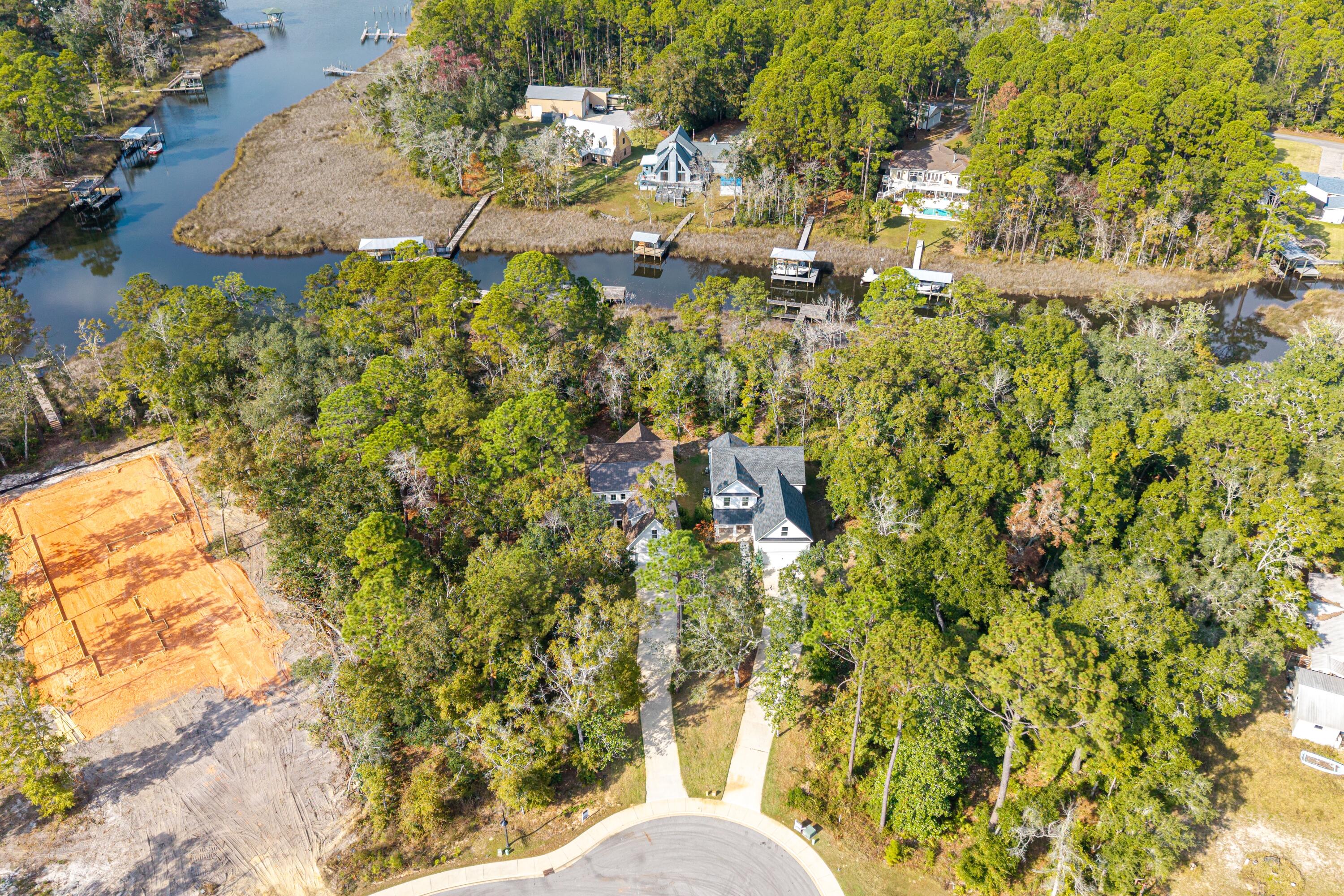 151 Redfish Pt Drive Freeport, FL 32439 - Photo 35 of 40 a view of a yard with plants