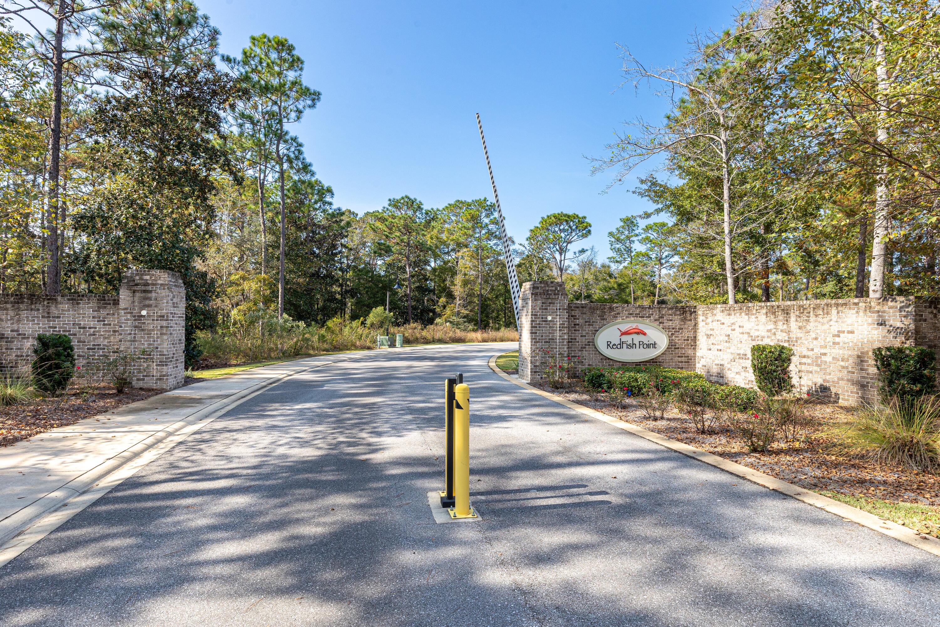 151 Redfish Pt Drive Freeport, FL 32439 - Photo 40 of 40 a sign board with a yard