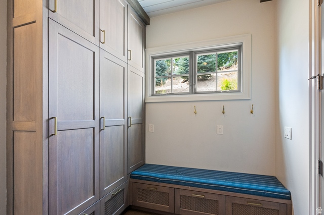 3 Carriagewood Cove, Unit 1088 Sandy, UT 84092 - Photo 27 of 79 Built-in cabinetry with brass hardware, integrated bench seating with storage, and a window providing natural illumination